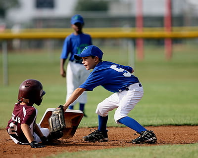 selective focus photography of baseball player in front of another baseball player HD wallpaper
