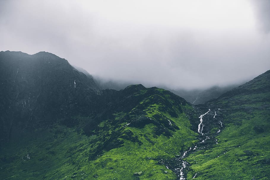 landscape photo of mountain with green trees, green and black mountain during white cloud HD wallpaper