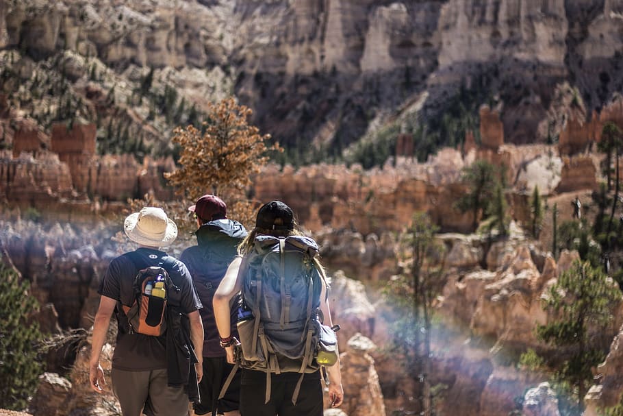 three people walking near mountains during daytime, adult, adventure, HD wallpaper