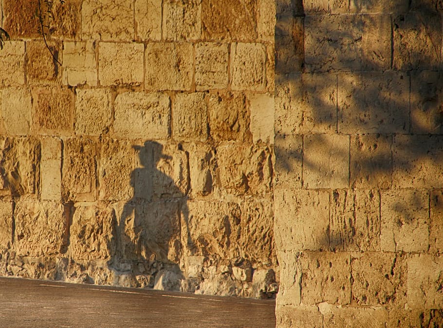 persons silhouette at brown concrete wall, shadows, jerusalem, HD wallpaper
