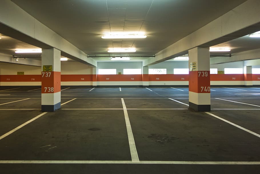 white and orange parking lot, multi storey car park, flat, park level