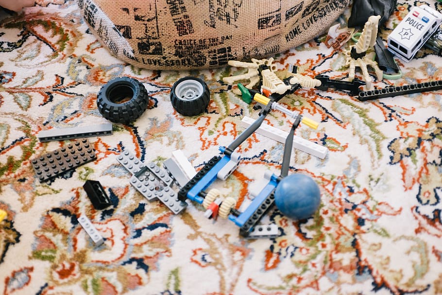 Toys on a carpet, objects, other, close-up, no people, day, indoors HD wallpaper