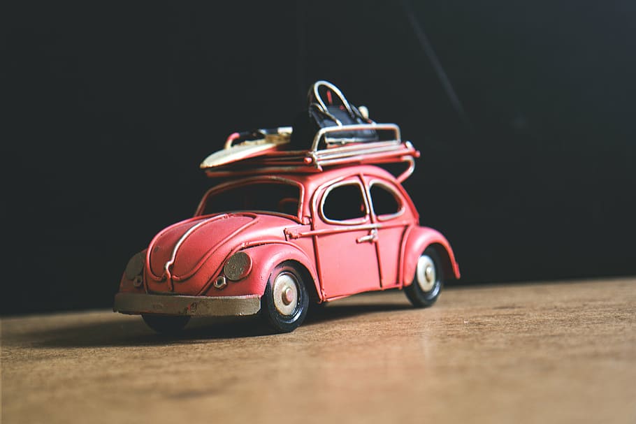 red Volkswagen Beetle scale model, selective, focus, photography