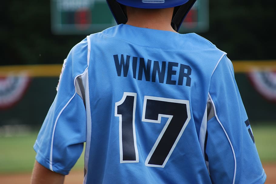boy wearing baseball jersey, children, winner, rear view, focus on foreground