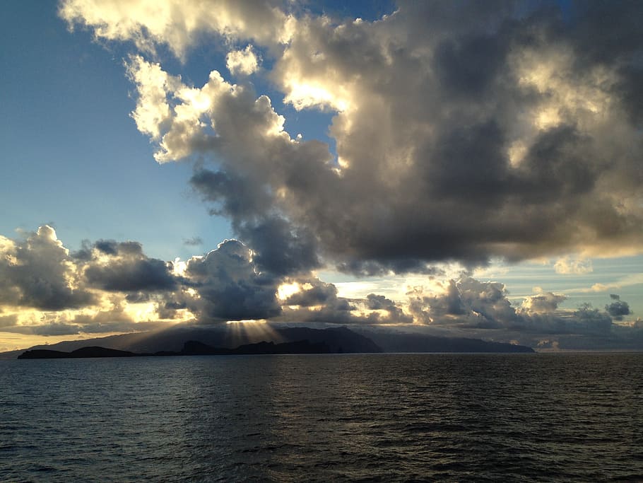 sunset, sea, clouds, light beam, rays, water, nature, landscape HD wallpaper