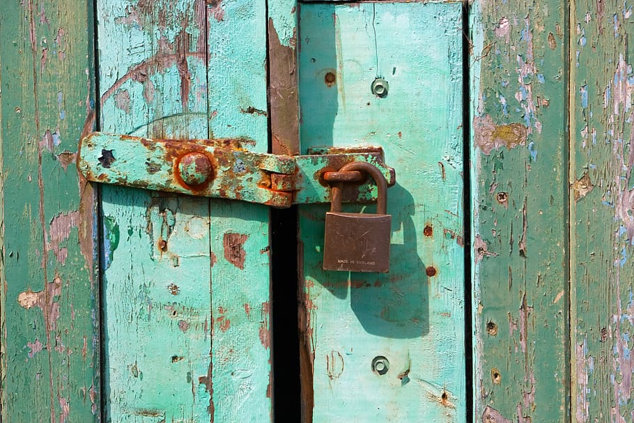 brown padlock on teal wooden door, grunge, rusty, rusting, texture