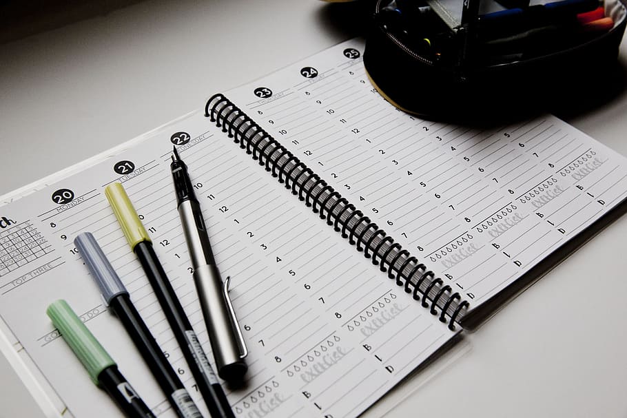 four pens placed on top of planner notebook, Open, Tombow, Weekly HD wallpaper