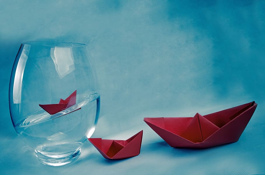 two red origami boats beside clear glass fish bowl filled with water, HD wallpaper