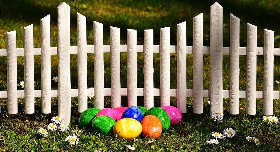 assorted-color stone near white wooden gate, easter, easter eggs HD wallpaper