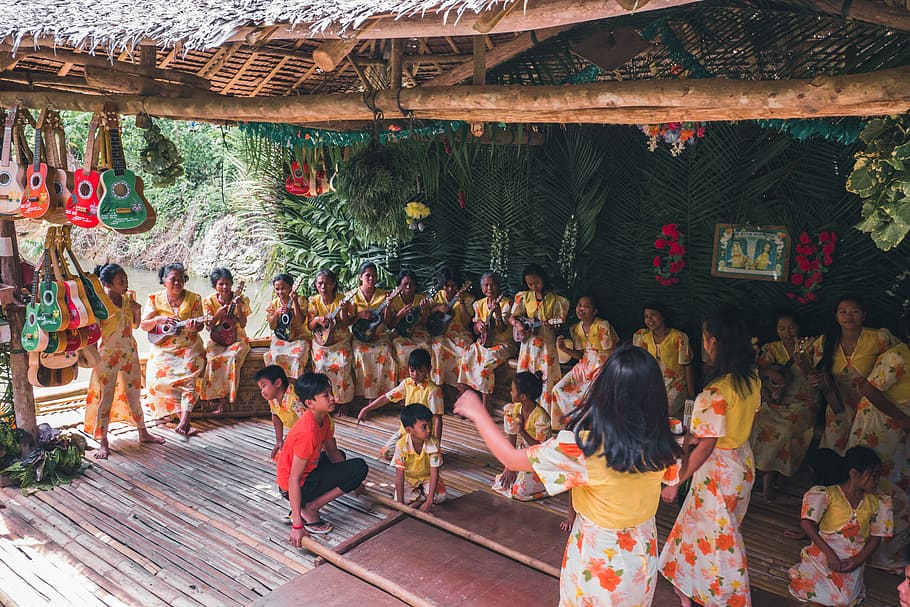 children dancing traditional dance, group of women sitting while playing instrument in front of children playing folk dance HD wallpaper