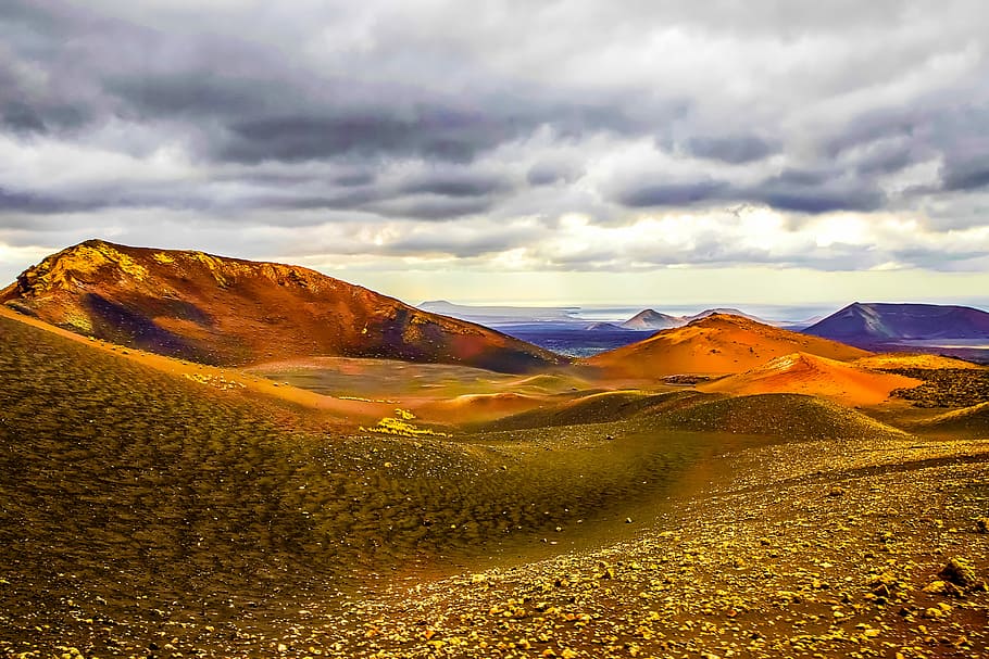 grass and soil covered field and mountains, mountain and clouds HD wallpaper