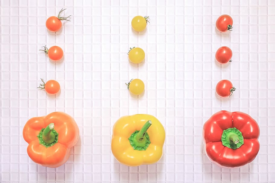 photo of orange, yellow and red bell peppers with cherry tomatoes HD wallpaper