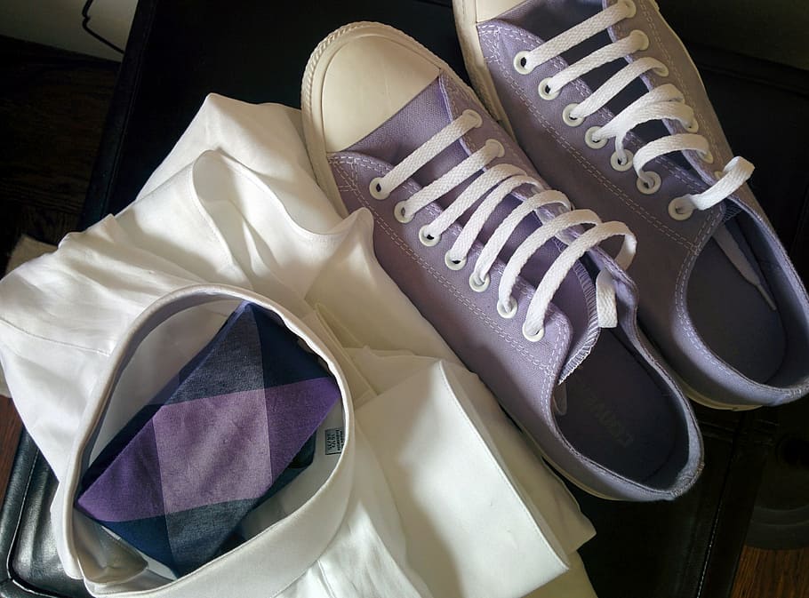 purple low-top sneakers beside white textile, wedding, clothes