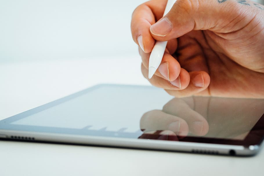 person holding white stylus pen, person holding white pen, touch screen HD wallpaper