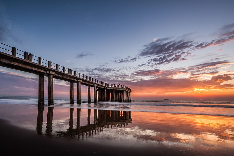 concrete bridge on body of water during sunset, pier, sunrise HD wallpaper