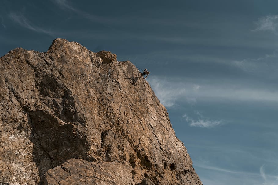 person on brown mountain, person climbing on cliff, rock, sky HD wallpaper