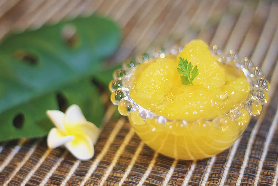 selective focus photography of puree with parsley garnish in clear glass bowl HD wallpaper