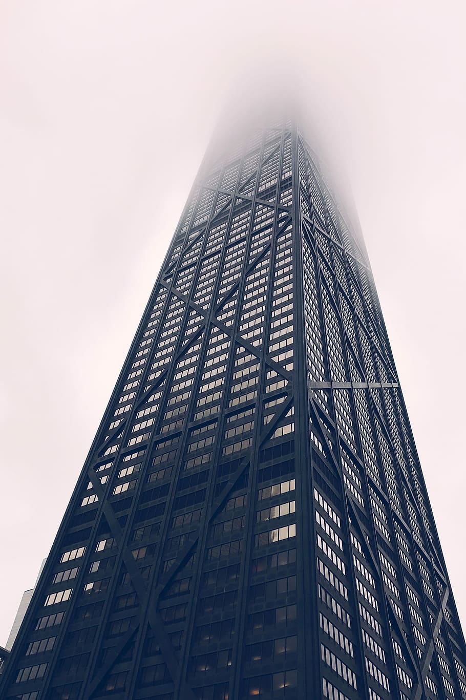 Disappearing Skyscrapers, low angle photography of building, fog