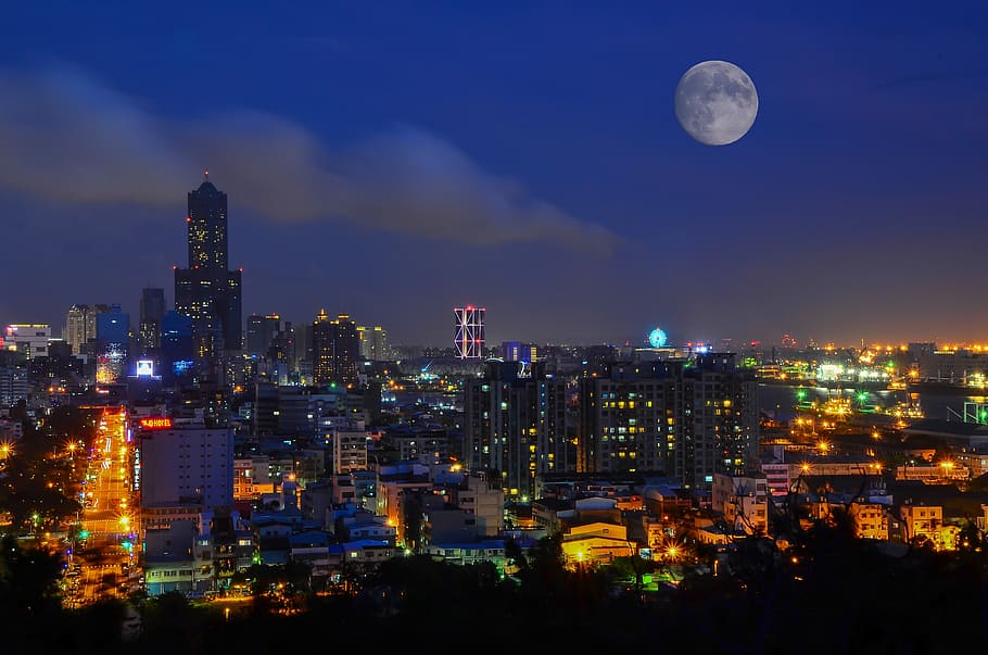city buildings under full moon during, the urban landscape, kaohsiung