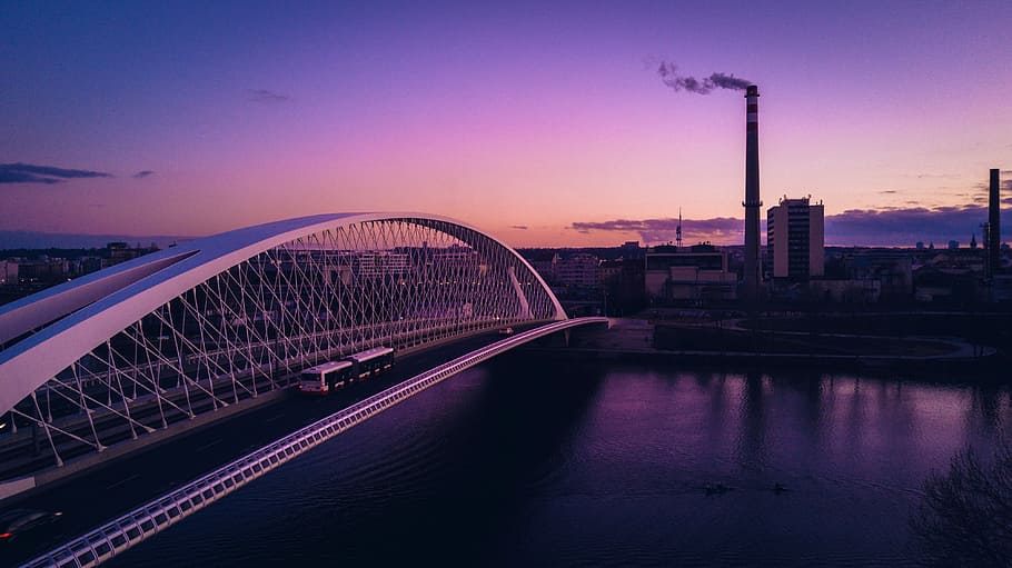 white bridge photo at golden hour, several vehicle on white concrete arch bridge HD wallpaper
