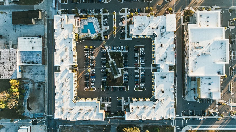 aerial view of buildings, aerial photography of white concrete building at daytime HD wallpaper