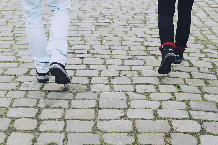 two person wearing white and black pants and sneakers walking on pavement, HD wallpaper