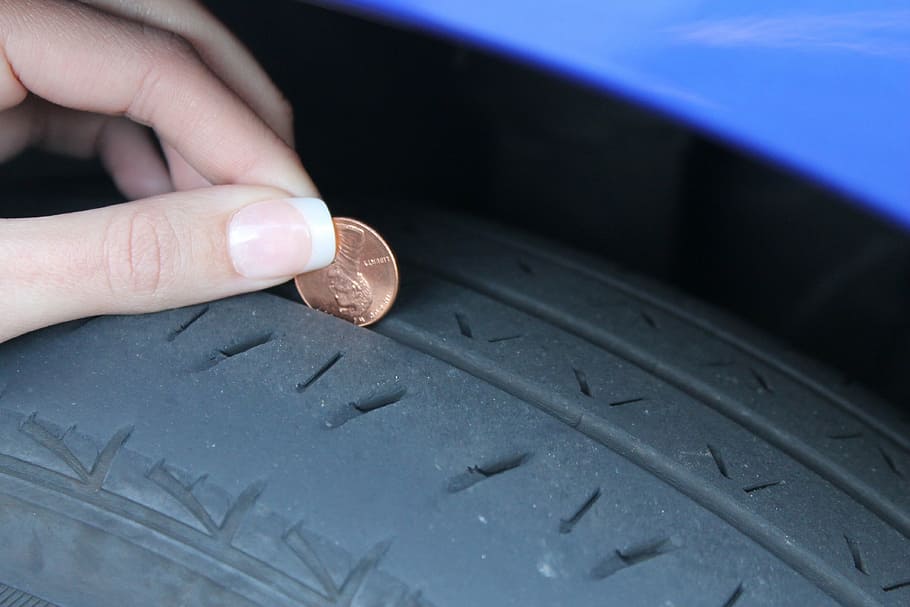 person holding coin near vehicle tire, penny, profile, test HD wallpaper
