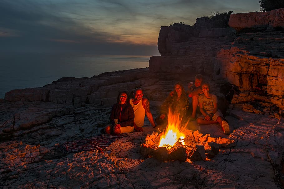 two men and three women sitting on front of campfire, burn HD wallpaper