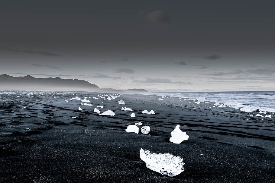 landscape photography of icebergs, Glacier Scatter, black sand beach