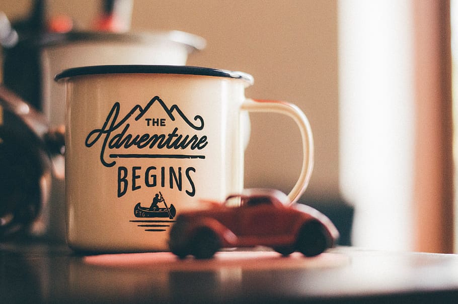 white The Adventure Begins ceramic mug, toy, car, table, bokeh HD wallpaper