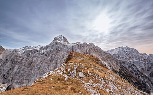 landscape photography of gray and brown mountains, mountain under gray sky during daytime HD wallpaper