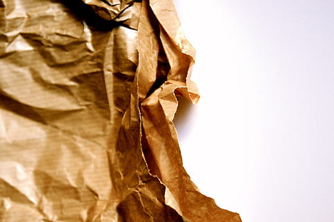 brown paper wrapper on top of white surface, old, fold, crumples HD wallpaper