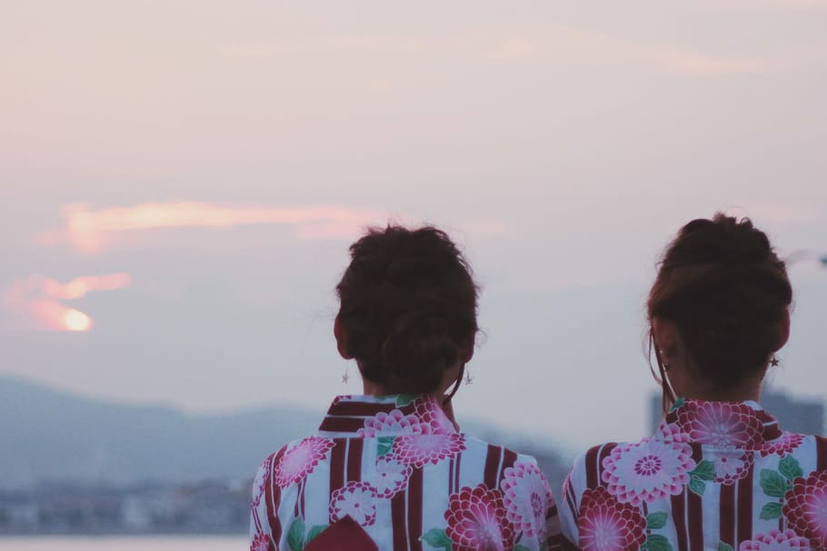 two women's wearing pink floral print blouses, child, time Of Day HD wallpaper