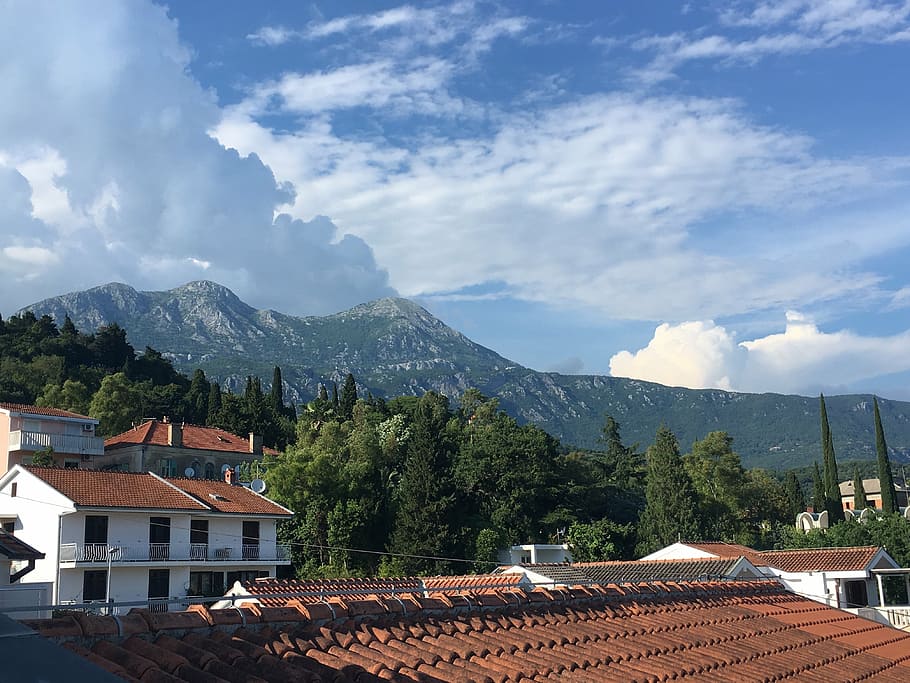 mountains, clouds, view, sky, natural, roof, architecture, europe HD wallpaper