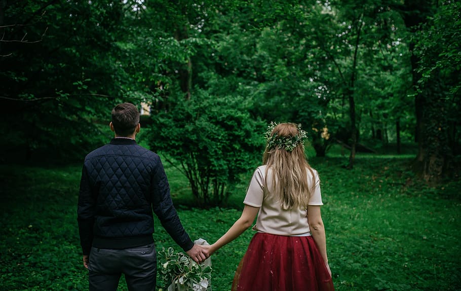 woman and man standing holding hands facing trees, couple holding hands \ HD wallpaper