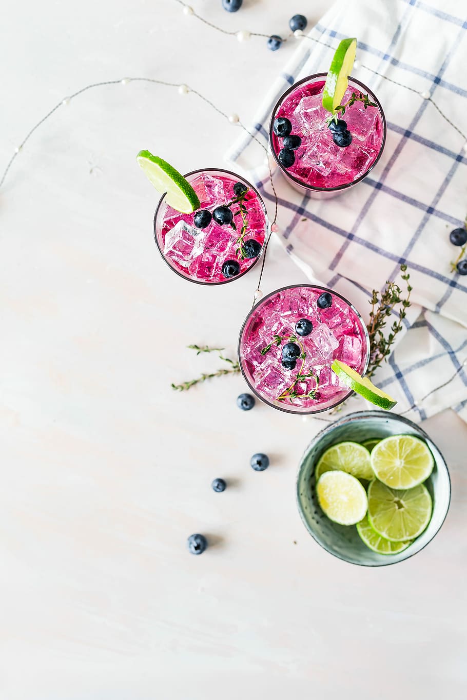 pink liquids served in drinking glasses, beverage with berries and lime in clear glasses HD wallpaper