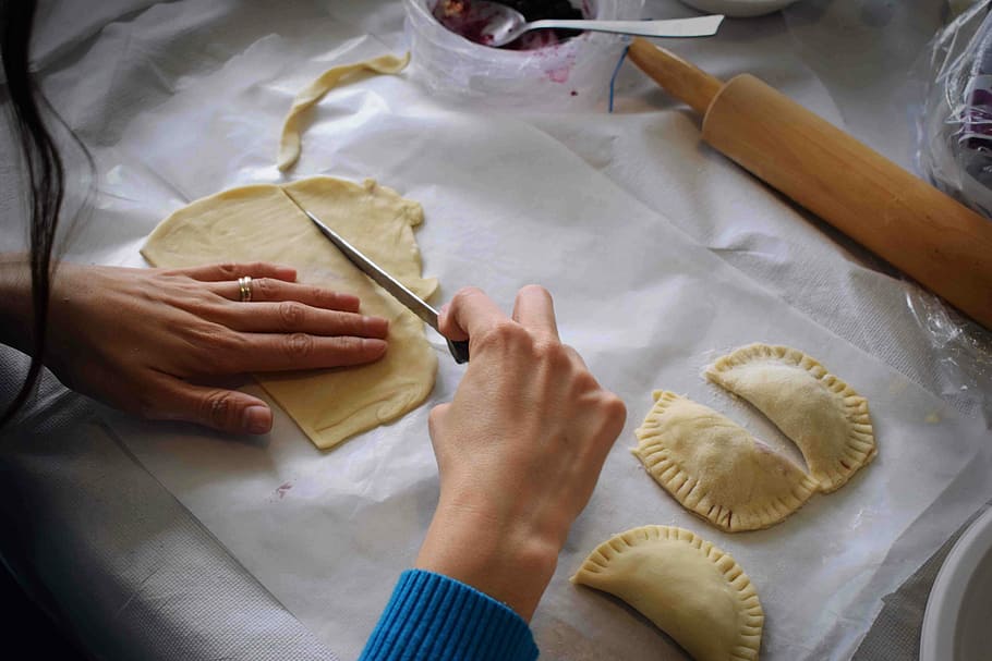 person making Empanadas, woman making dumplings, dough, hand HD wallpaper