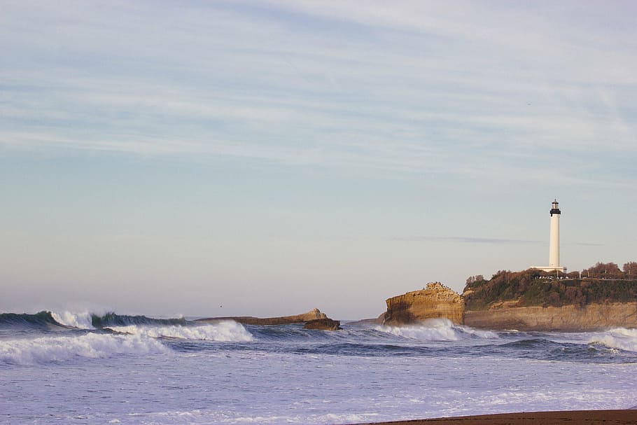 landscape photo of lighthouse on cliff near body of water, sea HD wallpaper