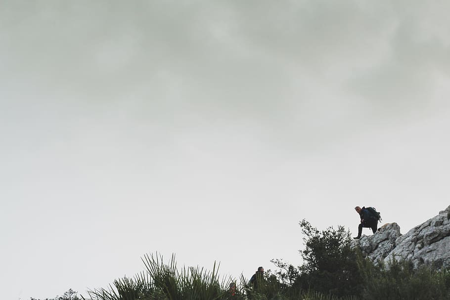 Person on Rocky Mountain Under White Cloudy Sky, adventure, backpacker HD wallpaper