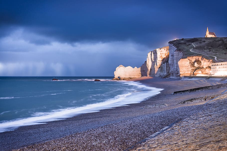 body of water during daytime, etretat, normandy, beach, cliff