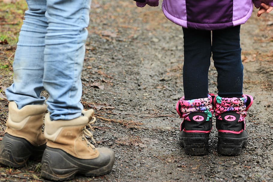 two person standing on brown soil, walking, hiking, rain, boots HD wallpaper