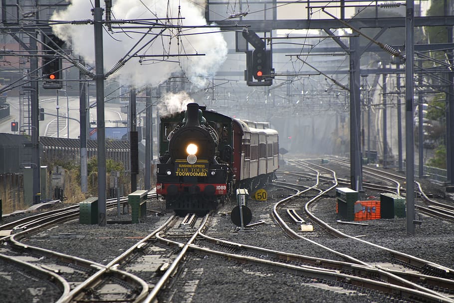 brown train on railway under gray sky, brisbane, steam, travel