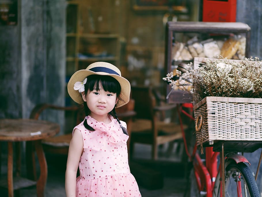 girl standing beside red bicycle, girl wearing pink dress standing beside red bike, HD wallpaper