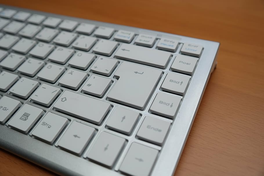 grey keyboard on brown wooden surface, return key, return button HD wallpaper