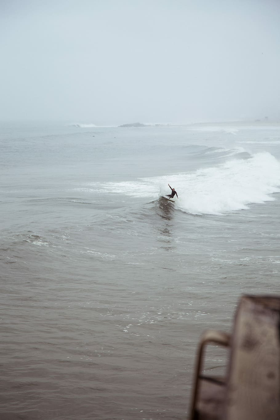 Rainy Day Snap, person riding on surfboard on body of water, sea HD wallpaper
