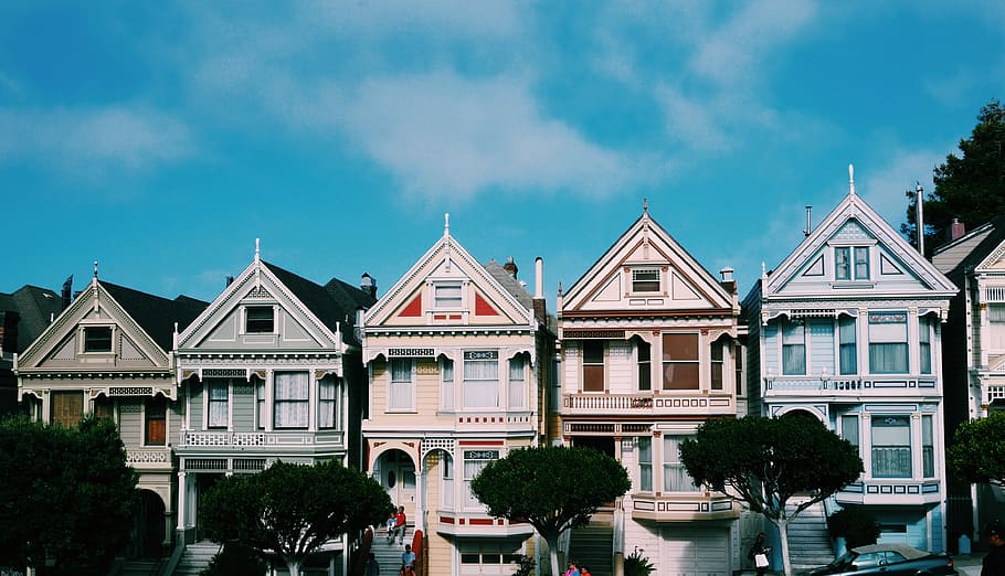 five assorted-color 2-storey houses, five 2-storey houses, painted ladies