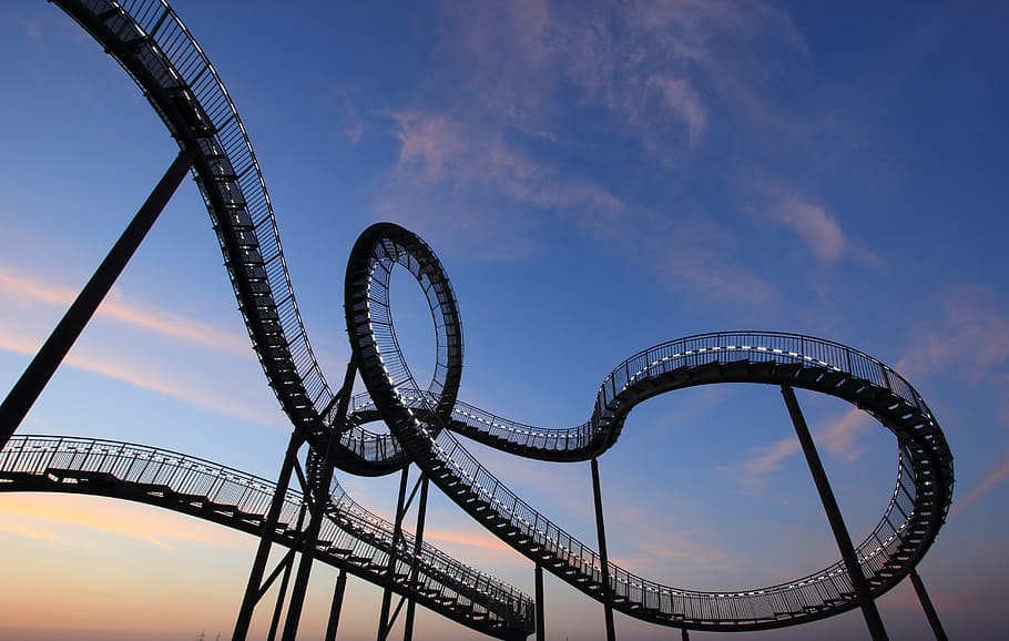 black metal high stairs under blue skies in low angle photography HD wallpaper