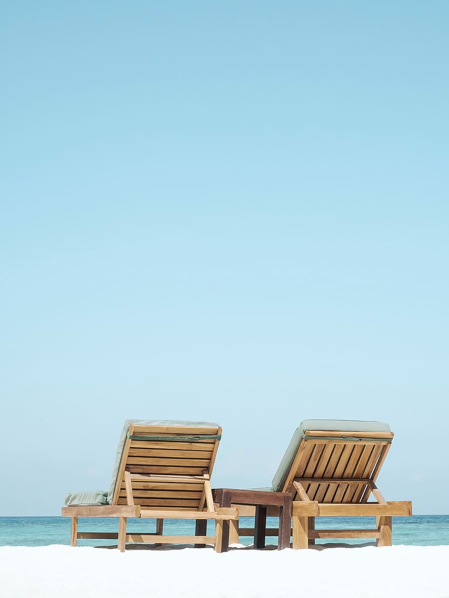 two brown wooden outdoor chaise loungers on beach, two brown loungers on beach, HD wallpaper