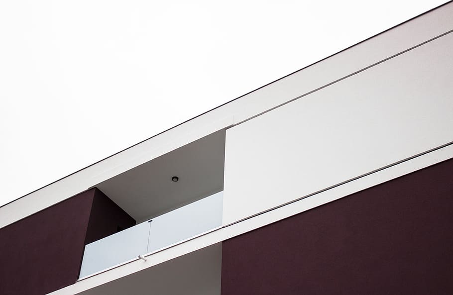 white and maroon painted building, low angle photo of white and brown building HD wallpaper
