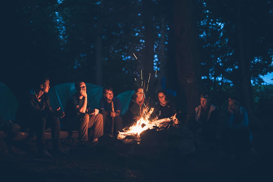 seven men sitting in front of bonfire during nighttime, outdoors HD wallpaper